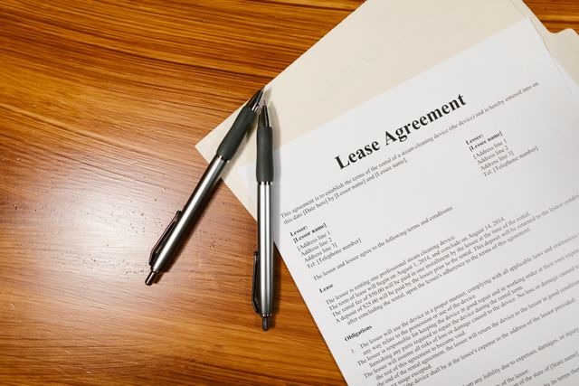 a lease agreement on a table